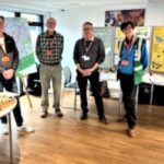 People in an exhibition space